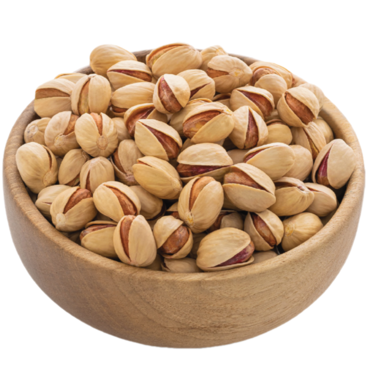 Fandoqi pistachios in a wooden bowl. it's variety of Iranian pistachios and they are round.
