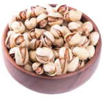 Kalleh Ghouchi pistachios in a wooden bowl. it's variety of Iranian pistachios and they are very long and elongated.